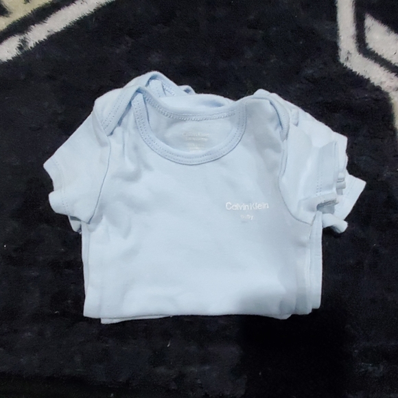 5 Calvin Klein Onesies - Picture 1 of 2